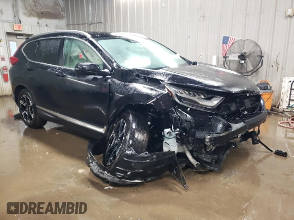 2017 Honda CR-V Touring with VIN 2HKRW2H91HH608340, listed as a Copart auction lot 43997625 with 58,446 mi miles and Salvage Title. Bid and sale history available at DreamBid. Image 4.