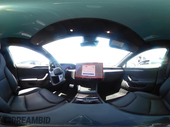 2023 Tesla Model S with VIN 5YJSA1E51PF499919, listed as a IAAI auction lot 42459166 with 6,612 mi miles and . Bid and sale history available at DreamBid. Image 21.