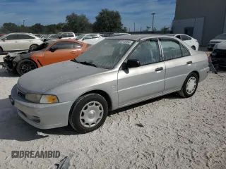 2001 Mitsubishi Mirage ES z VIN JA3AY26CX1U030593, wystawiony jako Copart lot #83749264 z przebiegiem 107 641 mil mil oraz Szkoda całkowita • Salvage title. Historia ofert i sprzedaży dostępna na DreamBid. Obrazek 1.