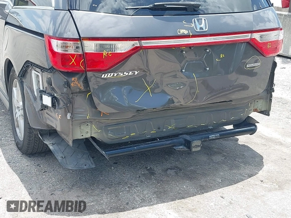 2013 Honda Odyssey Touring with VIN 5FNRL5H96DB068843, listed as a IAAI auction lot 42312176 with 115,804 mi miles and . Bid and sale history available at DreamBid. Image 6.
