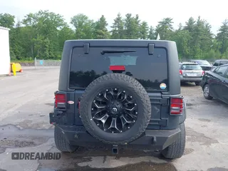 2016 Jeep Wrangler Unlimited Sport z VIN 1C4BJWDG4GL226180, wystawiony jako IAAI lot #42419561 z przebiegiem 76 522 mil mil oraz . Historia ofert i sprzedaży dostępna na DreamBid. Obrazek 17.