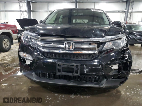 2016 Honda Pilot EX-L with VIN 5FNYF6H54GB056149, listed as a Copart auction lot 52232145 with 168,925 mi miles and Salvage Title. Bid and sale history available at carsss.com. Image 5.