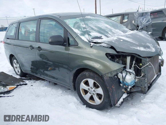 2014 Toyota Sienna L with VIN 5TDZK3DC2ES429684, listed as a IAAI auction lot 41529309 with 112,190 mi miles. Bid and sale history available at carsss.com. Image 1.