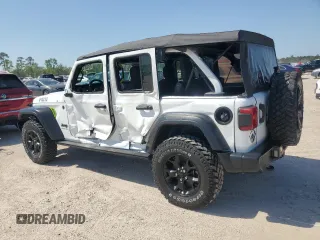 2023 Jeep Wrangler Willys with VIN 1C4HJXDN5PW510494, listed as a Copart auction lot 51673795 with 19,371 mi miles and Non Repairable. Bid and sale history available at DreamBid. Image 2.