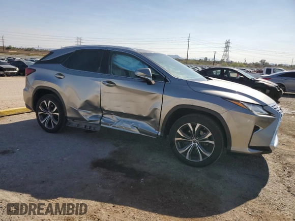 2019 Lexus RX 350 with VIN 2T2ZZMCA0KC134617, listed as a Copart auction lot 59765415 with 77,726 mi miles and Salvage title. Bid and sale history available at DreamBid. Image 4.