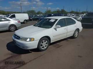 1999 Nissan Altima XE with VIN 1N4DL01D2XC125672, listed as a IAAI auction lot 41379153 with 183,685 mi miles. Bid and sale history available at carsss.com. Image 2.