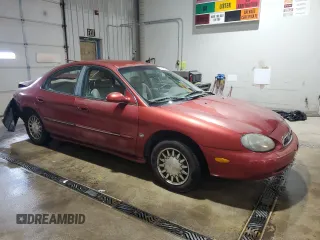 1998 Mercury Sable LS Premium Group z VIN 1MEFM53S5WA631627, wystawiony jako Copart lot #53342725 z przebiegiem 103 428 mil mil oraz Szkoda całkowita • Salvage title. Historia ofert i sprzedaży dostępna na DreamBid. Obrazek 4.