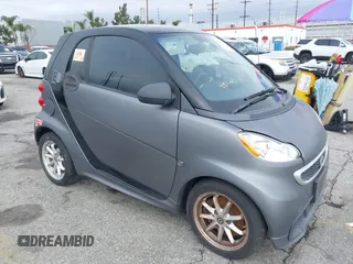 2016 Smart fortwo Passion with VIN WMEEJ9AAXGK845128, listed as a IAAI auction lot 41724866 with 34,159 mi miles and . Bid and sale history available at DreamBid. Image 1.