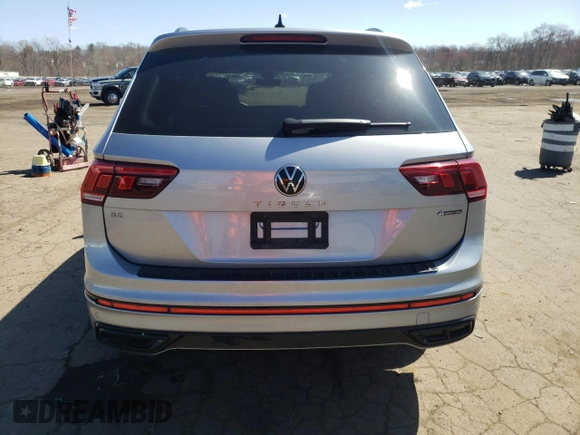 2023 Volkswagen Tiguan SE R-Line Black with VIN 3VV8B7AX3PM090643, listed as a Copart auction lot 52225065 with 60,680 mi miles and Salvage title. Bid and sale history available at DreamBid. Image 6.