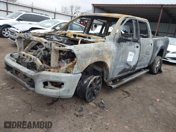 2023 Ram 2500 Laramie with VIN 3C6UR5FLXPG580487, listed as a IAAI auction lot 40980361 with 1 mi miles. Bid and sale history available at carsss.com. Image 2.