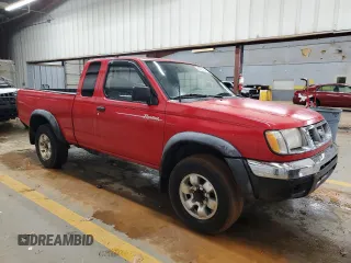 1999 Nissan Frontier XE with VIN 1N6ED26Y5XC308158, listed as a Copart auction lot 84320904 with 316,532 mi miles and Clean title. Bid and sale history available at DreamBid. Image 4.