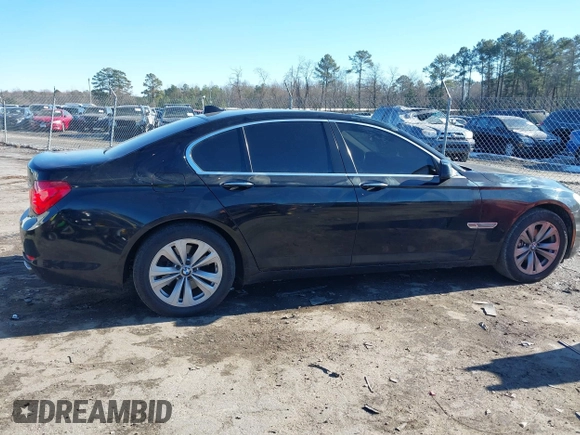 2011 BMW 7 Series 740i with VIN WBAKA4C58BC392020, listed as a IAAI auction lot 41314751 with 116,553 mi miles. Bid and sale history available at carsss.com. Image 13.