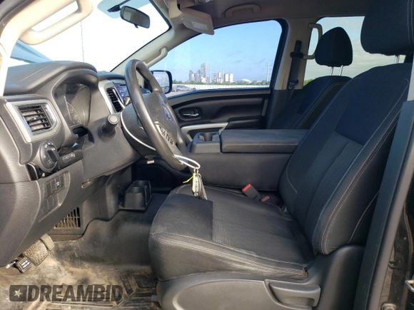 2018 Nissan Titan SV z VIN 1N6AA1EJ3JN548939, wystawiony jako Copart lot #54336555 z przebiegiem 152 859 mil mil oraz Czysty tytuł • Clean title. Historia ofert i sprzedaży dostępna na DreamBid. Obrazek 7.