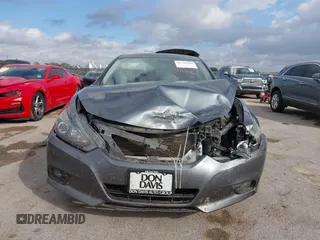 2018 Nissan Altima 2.5 S with VIN 1N4AL3AP9JC288485, listed as a IAAI auction lot 40718406 with 106,819 mi miles. Bid and sale history available at carsss.com. Image 12.