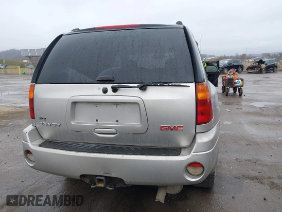 2006 GMC Envoy SLE z VIN 1GKDT13S562187698, wystawiony jako IAAI lot #41808778 z przebiegiem 167 023 mil mil oraz . Historia ofert i sprzedaży dostępna na DreamBid. Obrazek 16.
