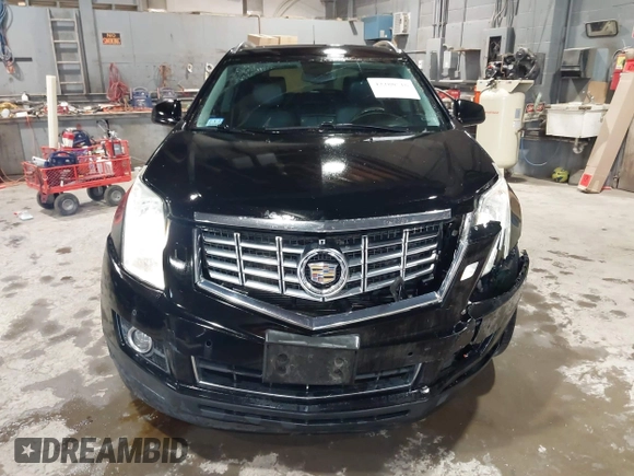 2012 Cadillac SRX Performance Collection z VIN 3GYFNEE37CS630391, wystawiony jako IAAI lot #42280516 z przebiegiem 137 330 mil mil oraz . Historia ofert i sprzedaży dostępna na DreamBid. Obrazek 12.