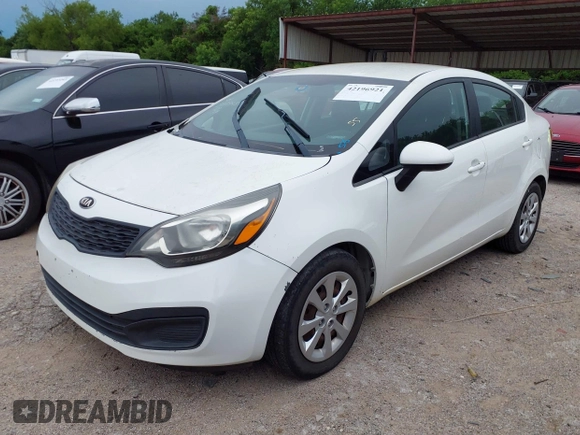 2014 Kia Rio LX with VIN KNADM4A3XE6384733, listed as a IAAI auction lot 42196921 with 153,084 mi miles and . Bid and sale history available at DreamBid. Image 2.