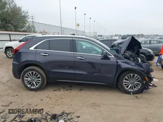 2025 Cadillac XT4 FWD Premium Luxury z VIN 1GYFZCR40SF148814, wystawiony jako IAAI lot #41598124 z przebiegiem Nie podano mil oraz . Historia ofert i sprzedaży dostępna na DreamBid. Obrazek 14.