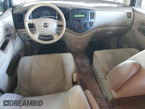 2000 Mazda MPV DX with VIN JM3LW28G8Y0142883, listed as a Copart auction lot 82633154 with 161,196 mi miles and Salvage title. Bid and sale history available at DreamBid. Image 8.