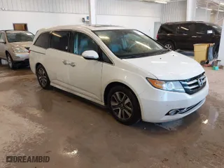 2016 Honda Odyssey Touring Elite with VIN 5FNRL5H95GB134206, listed as a IAAI auction lot 41664593 with 239,897 mi miles. Bid and sale history available at carsss.com. Image 1.