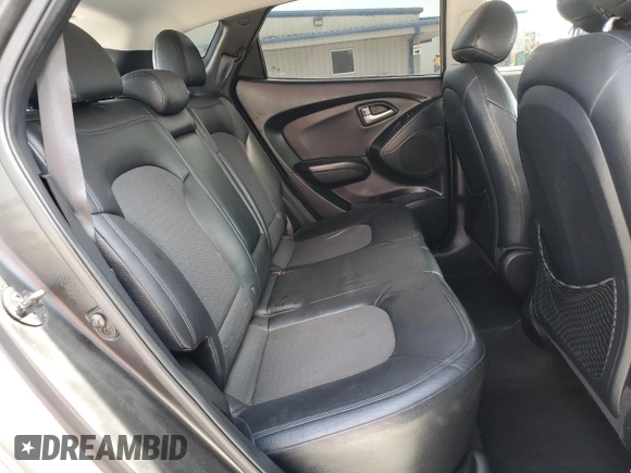 2010 Hyundai Tucson GLS with VIN KM8JU3AC2AU079129, listed as a Copart auction lot 54312875 with 116,659 mi miles and Salvage Title. Bid and sale history available at DreamBid. Image 11.