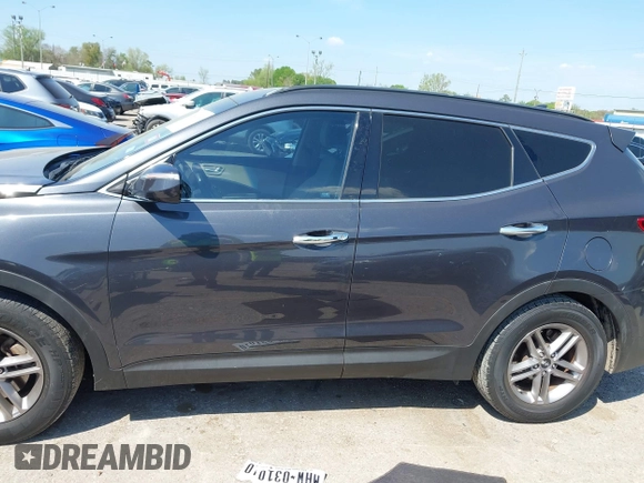 2017 Hyundai Santa Fe 2.4L z VIN 5XYZU3LB4HG462058, wystawiony jako IAAI lot #41861190 z przebiegiem 87 102 mil mil oraz . Historia ofert i sprzedaży dostępna na DreamBid. Obrazek 14.