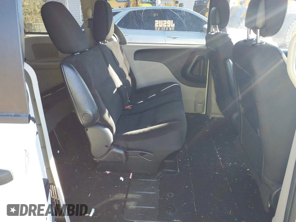 2019 Dodge Grand Caravan SE with VIN 2C4RDGBG2KR799660, listed as a IAAI auction lot 41898556 with 104,642 mi miles and . Bid and sale history available at DreamBid. Image 8.