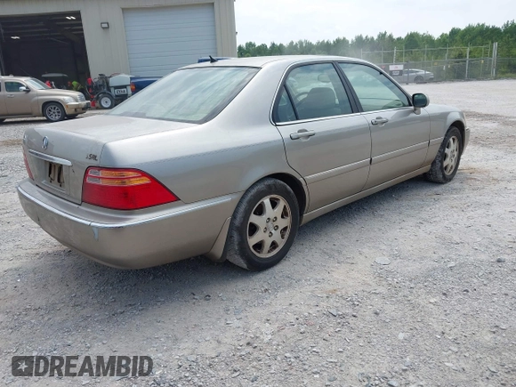 2002 Acura RL with VIN JH4KA96542C001374, listed as a IAAI auction lot 42425314 with Not provided miles and . Bid and sale history available at DreamBid. Image 4.