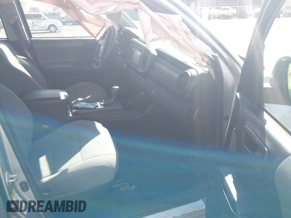 2017 Toyota Tacoma SR with VIN 5TFAX5GNXHX098715, listed as a IAAI auction lot 41381938 with 155,787 mi miles. Bid and sale history available at carsss.com. Image 5.