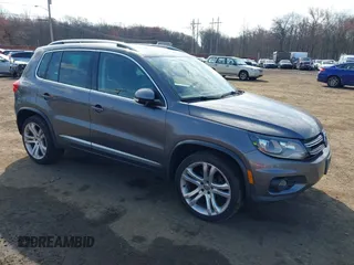 2012 Volkswagen Tiguan SE with VIN WVGBV7AX8CW092373, listed as a IAAI auction lot 41991441 with 138,982 mi miles and . Bid and sale history available at DreamBid. Image 1.