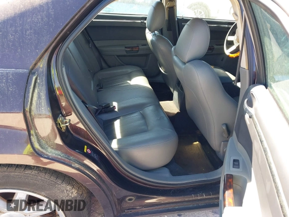 2005 Chrysler 300 with VIN 2C3AA63H75H577363, listed as a IAAI auction lot 41892999 with 229,634 mi miles. Bid and sale history available at carsss.com. Image 8.