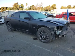 2011 Dodge Charger RT Plus with VIN 2B3CM5CT6BH517548, listed as a Copart auction lot 82219834 with 114,134 mi miles and Salvage Title. Bid and sale history available at carsss.com. Image 4.