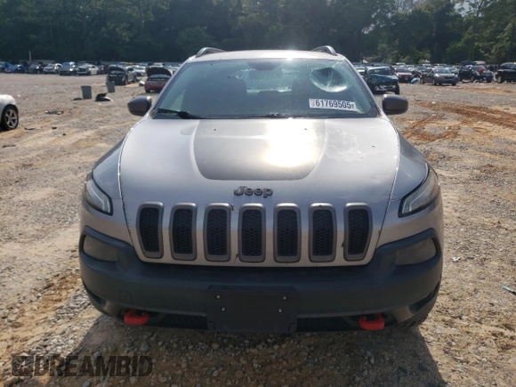 2016 Jeep Cherokee Trailhawk z VIN 1C4PJMBSXGW121272, wystawiony jako Copart lot #61769505 z przebiegiem 119 353 mil mil oraz Szkoda całkowita • Salvage title. Historia ofert i sprzedaży dostępna na DreamBid. Obrazek 5.