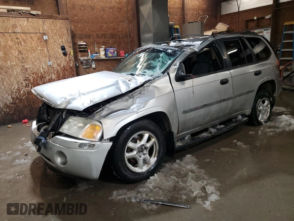 2007 GMC Envoy SLE with VIN 1GKDT13S572301992, listed as a Copart auction lot 87404174 with 131,741 mi miles and Salvage Title. Bid and sale history available at carsss.com. Image 1.