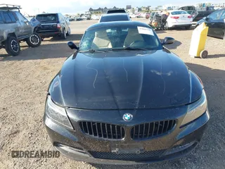 2012 BMW Z4 sDrive28i z VIN WBALL5C56CE716558, wystawiony jako IAAI lot #42065347 z przebiegiem 93 438 mil mil oraz . Historia ofert i sprzedaży dostępna na DreamBid. Obrazek 11.