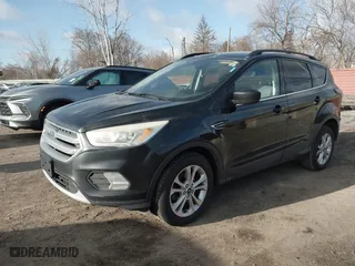 2017 Ford Escape SE with VIN 1FMCU0GD7HUD85843, listed as a IAAI auction lot 41874494 with 138,243 mi miles. Bid and sale history available at carsss.com. Image 19.