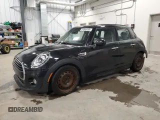 2019 MINI Hardtop 4 Door Cooper with VIN WMWXU1C58K2H74102, listed as a Copart auction lot 51065765 with 136,441 mi miles and Salvage title. Bid and sale history available at DreamBid. Image 1.