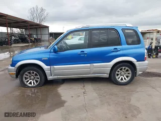 2004 Suzuki Grand Vitara with VIN JS3TE62V544100539, listed as a IAAI auction lot 41900314 with 192,776 mi miles. Bid and sale history available at carsss.com. Image 14.
