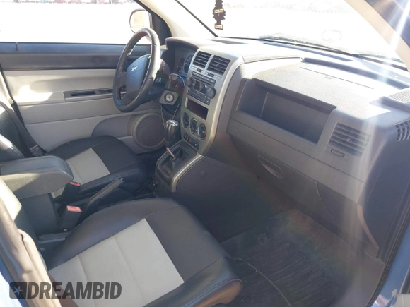 2007 Jeep Compass Limited with VIN 1J8FF57W87D409777, listed as a IAAI auction lot 41233357 with 125,019 mi miles. Bid and sale history available at carsss.com. Image 5.