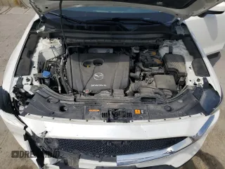 2021 Mazda CX-5 Touring z VIN JM3KFBCM9M1386068, wystawiony jako Copart lot #51735225 z przebiegiem 68 728 mil mil oraz Szkoda całkowita • Salvage title. Historia ofert i sprzedaży dostępna na DreamBid. Obrazek 14.