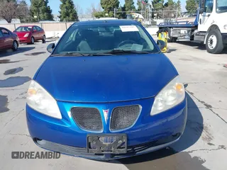2006 Pontiac G6 GTP with VIN 1G2ZM171164167148, listed as a IAAI auction lot 41597445 with 117,227 mi miles. Bid and sale history available at carsss.com. Image 6.