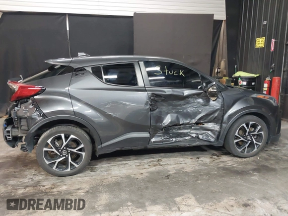 2019 Toyota C-HR XLE z VIN NMTKHMBX3KR083103, wystawiony jako IAAI lot #41935669 z przebiegiem 39 841 mil mil oraz . Historia ofert i sprzedaży dostępna na DreamBid. Obrazek 13.