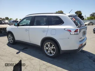 2015 Mitsubishi Outlander SE with VIN JA4AD3A38FZ002614, listed as a Copart auction lot 57643295 with 95,419 mi miles and Salvage title. Bid and sale history available at DreamBid. Image 2.