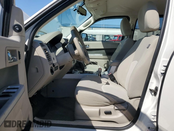 2010 Mercury Mariner Hybrid with VIN 4M2CN3K39AKJ09337, listed as a Copart auction lot 48398335 with 221,248 mi miles and Salvage Title. Bid and sale history available at carsss.com. Image 7.