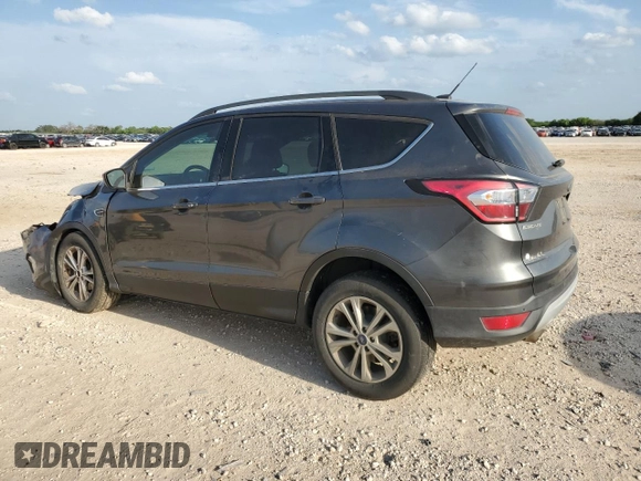 2017 Ford Escape SE with VIN 1FMCU0GD7HUD93215, listed as a Copart auction lot 54966295 with 153,704 mi miles and Salvage Title. Bid and sale history available at DreamBid. Image 2.