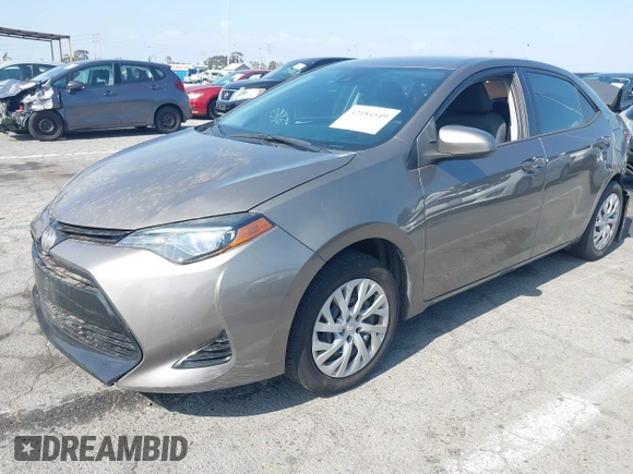 2018 Toyota Corolla L с VIN 5YFBURHEXJP845530, выставлен на аукционе IAAI как лот 42184549 с пробегом 113 379 миль миль и . История ставок и продаж доступна на DreamBid. Изображение 17.