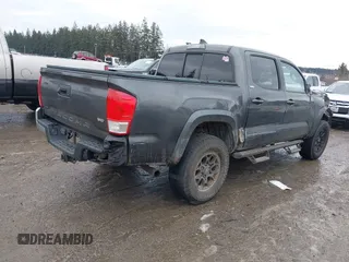 2017 Toyota Tacoma SR5 with VIN 3TMAZ5CN5HM038170, listed as a IAAI auction lot 41588399 with 152,469 mi miles. Bid and sale history available at carsss.com. Image 4.