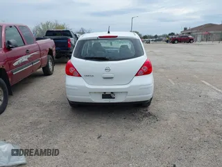2009 Nissan Versa S with VIN 3N1BC13E39L450242, listed as a IAAI auction lot 42145528 with 239,291 mi miles and . Bid and sale history available at DreamBid. Image 17.