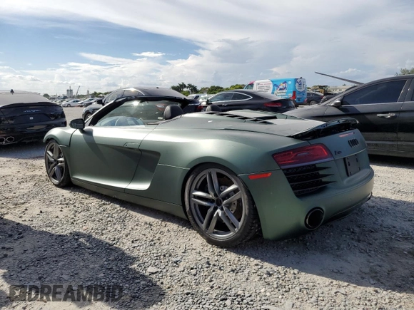2015 Audi R8 z VIN WUASUAFG1F7001863, wystawiony jako Copart lot #68133794 z przebiegiem 10 571 mil mil oraz Szkody całkowita. Historia ofert i sprzedaży dostępna na DreamBid. Obrazek 2.