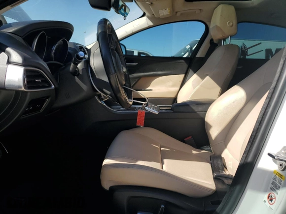 2019 Jaguar XE 25t Premium with VIN SAJAD4FX9KCP49404, listed as a Copart auction lot 48826365 with 141,322 mi miles and Salvage Title. Bid and sale history available at DreamBid. Image 7.
